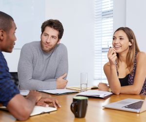 Three people at table